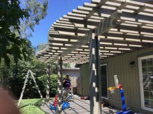 Aluminum patio cover providing shade and enhancing outdoor living space